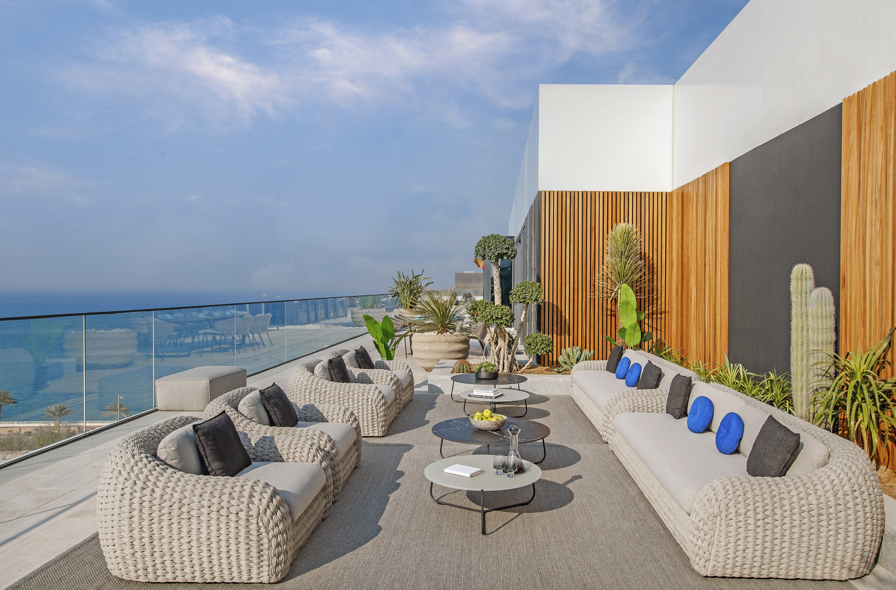 Outdoor sunbeds, loungers, umbrellas and daybeds at Serenia Residences Palm | Nakkash