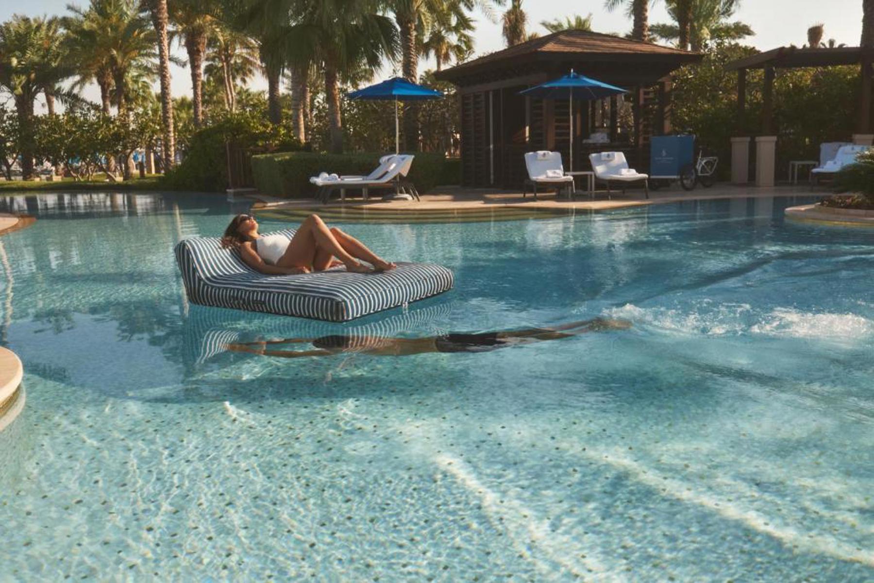 Nakkash Contract Oliver James Lilos Dubai – hospitality hotel pool designer luxury inflatables