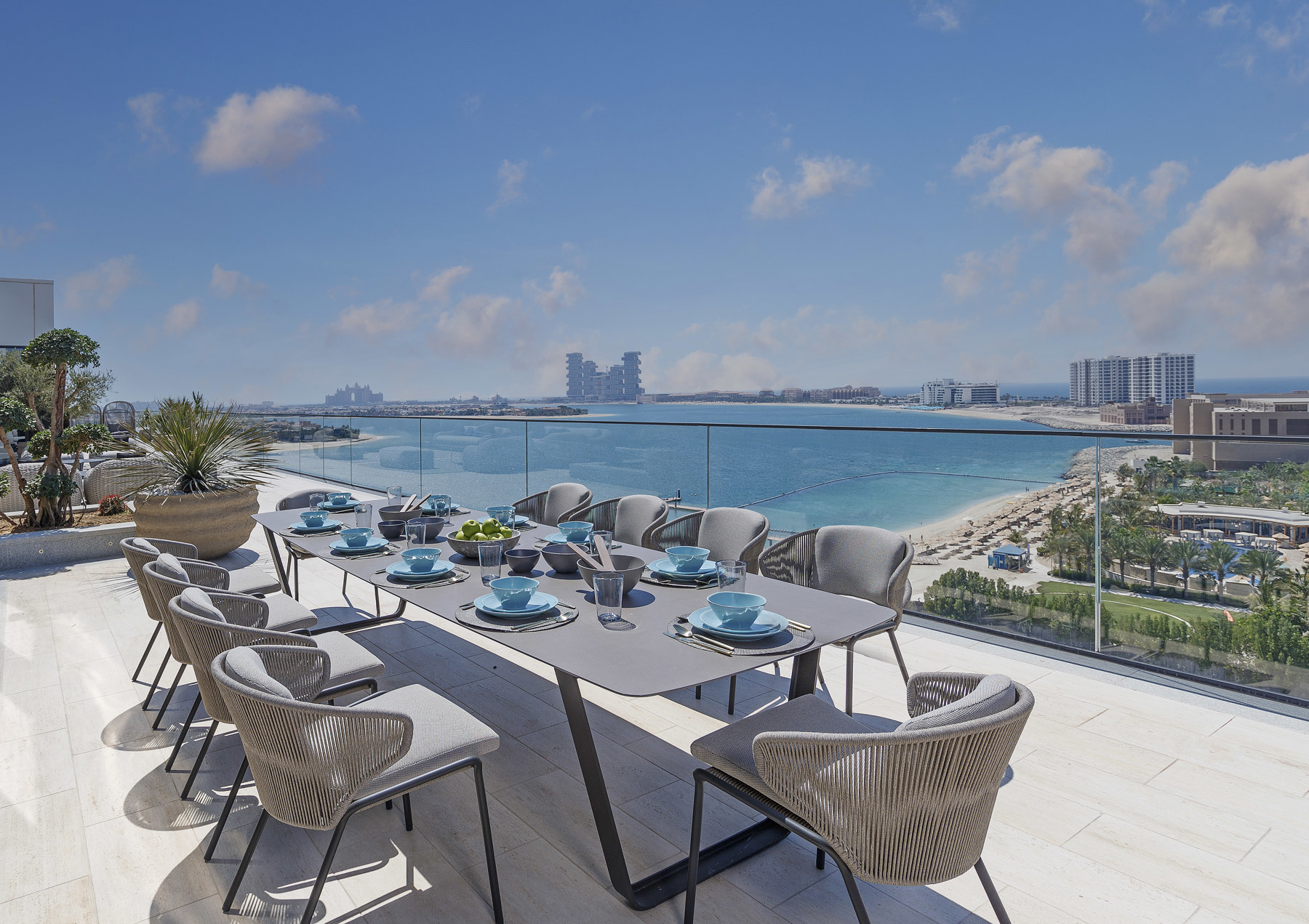 Outdoor dining tables and chairs at Serenia Residences Palm | Nakkash