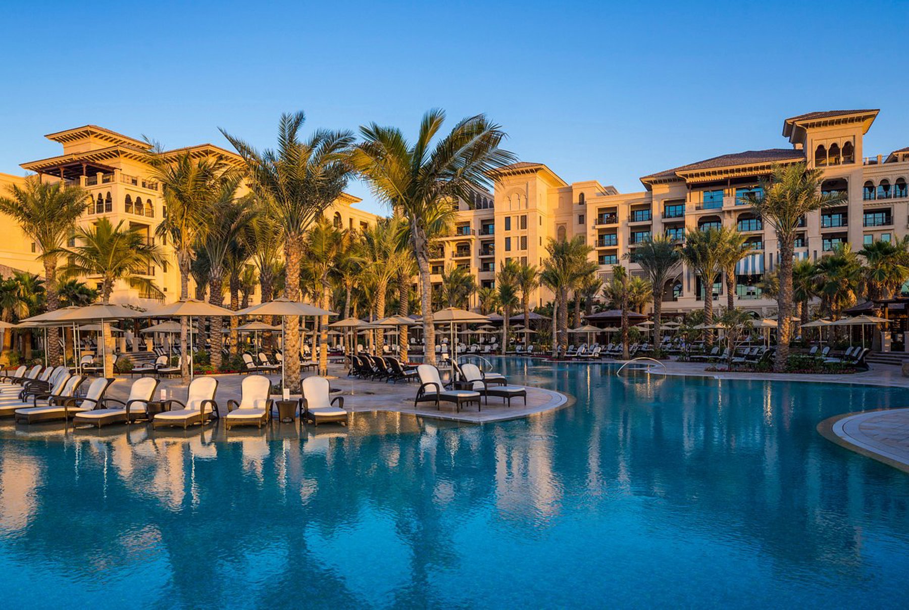 Nakkash Contract Dedon Dubai – premium hospitality hotel pool outdoor furniture with sunbed and umbrella