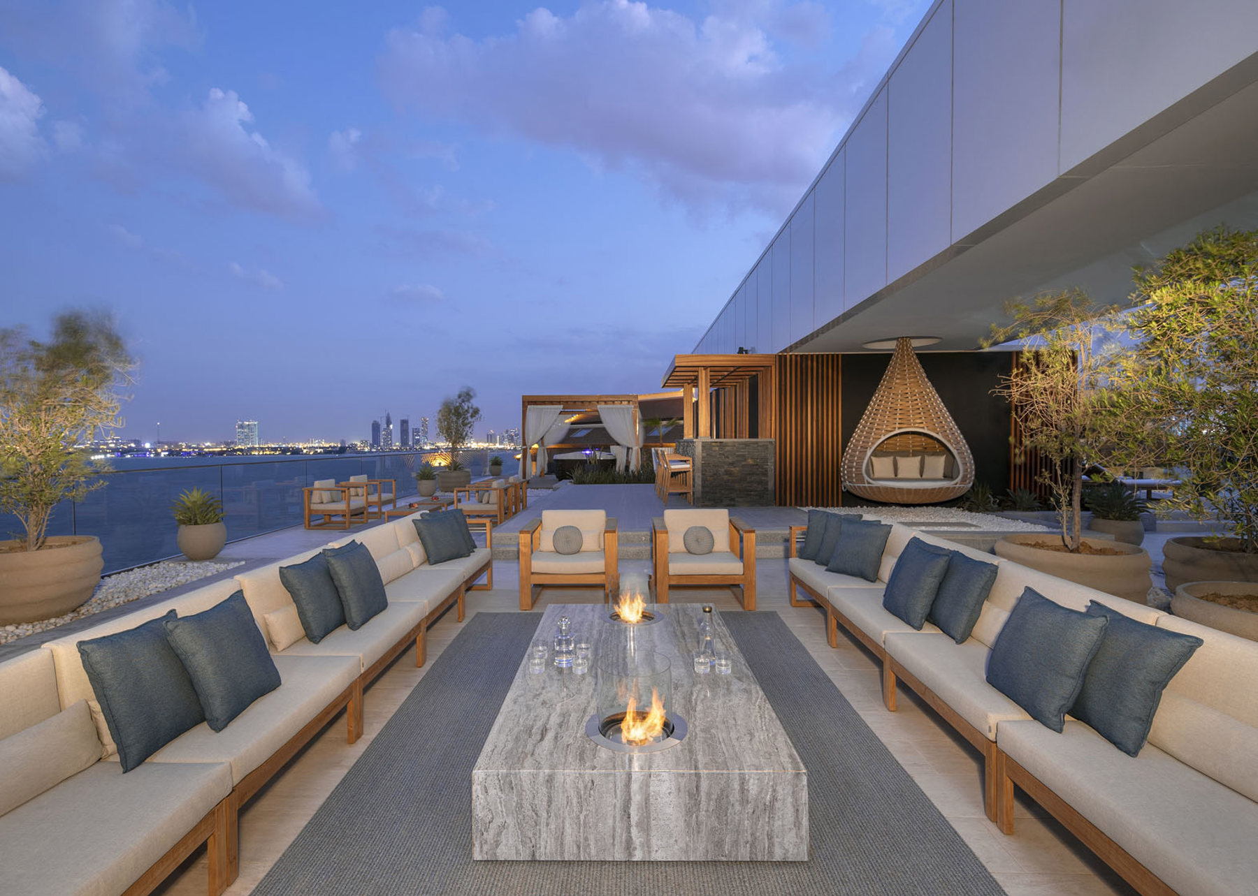 Outdoor sunbeds, loungers, umbrellas and daybeds at Serenia Residences Palm | Nakkash