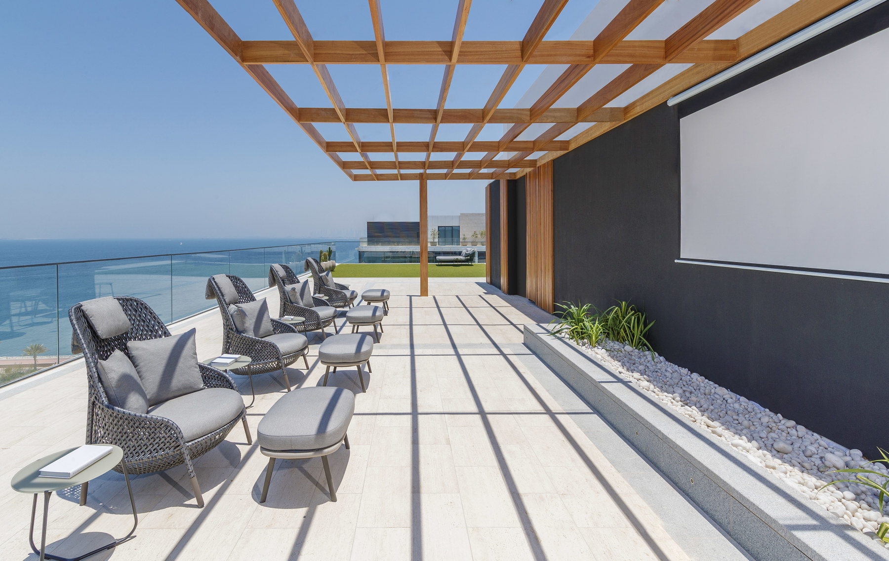 Outdoor sunbeds, loungers, umbrellas and daybeds at Serenia Residences Palm | Nakkash